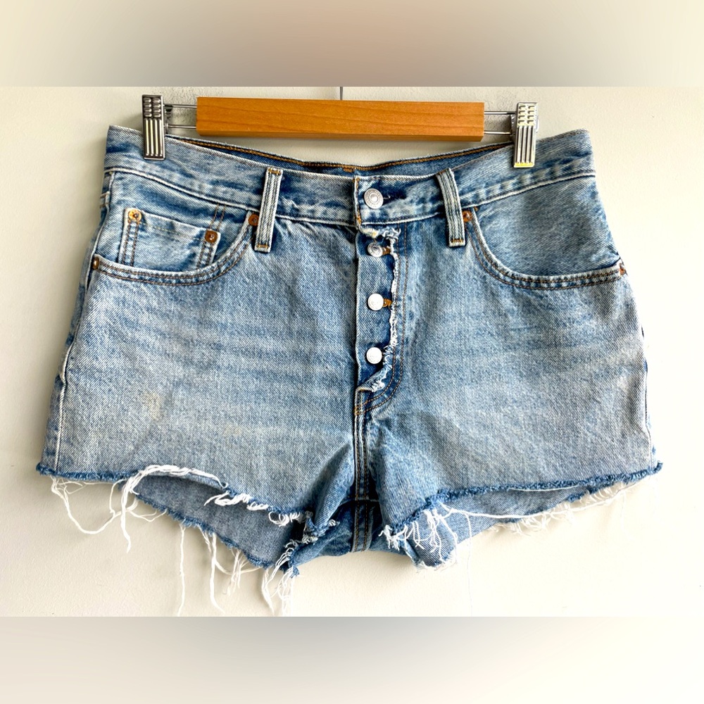 Levi’s 501 light wash distressed denim shorts